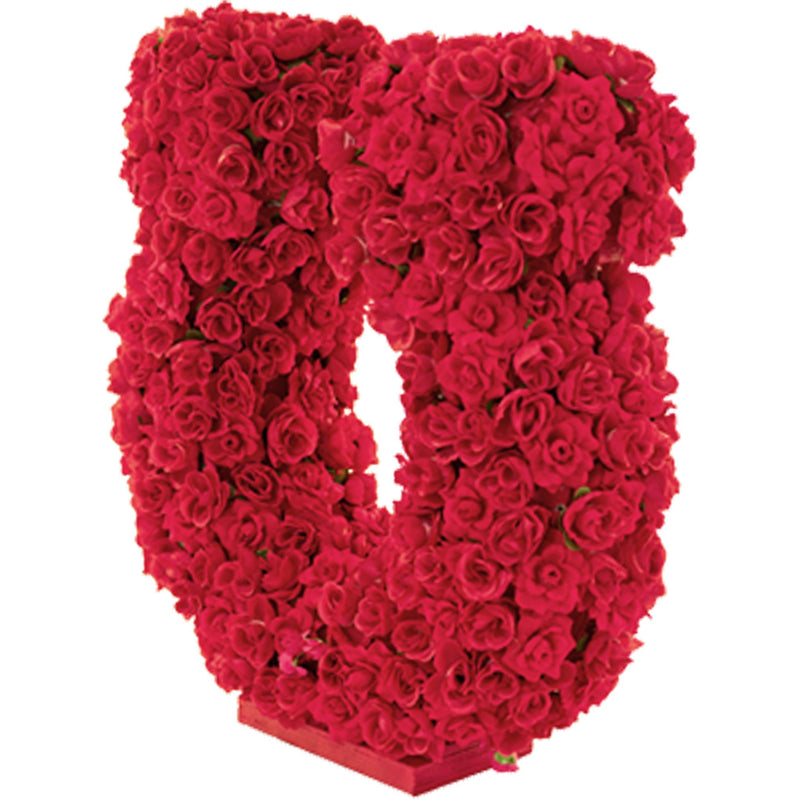 18in tall Rose Petal Horseshoe Centerpiece and Tabletop Display made with artificial rosebud flowers on a foam core and a wooden base painted in red.