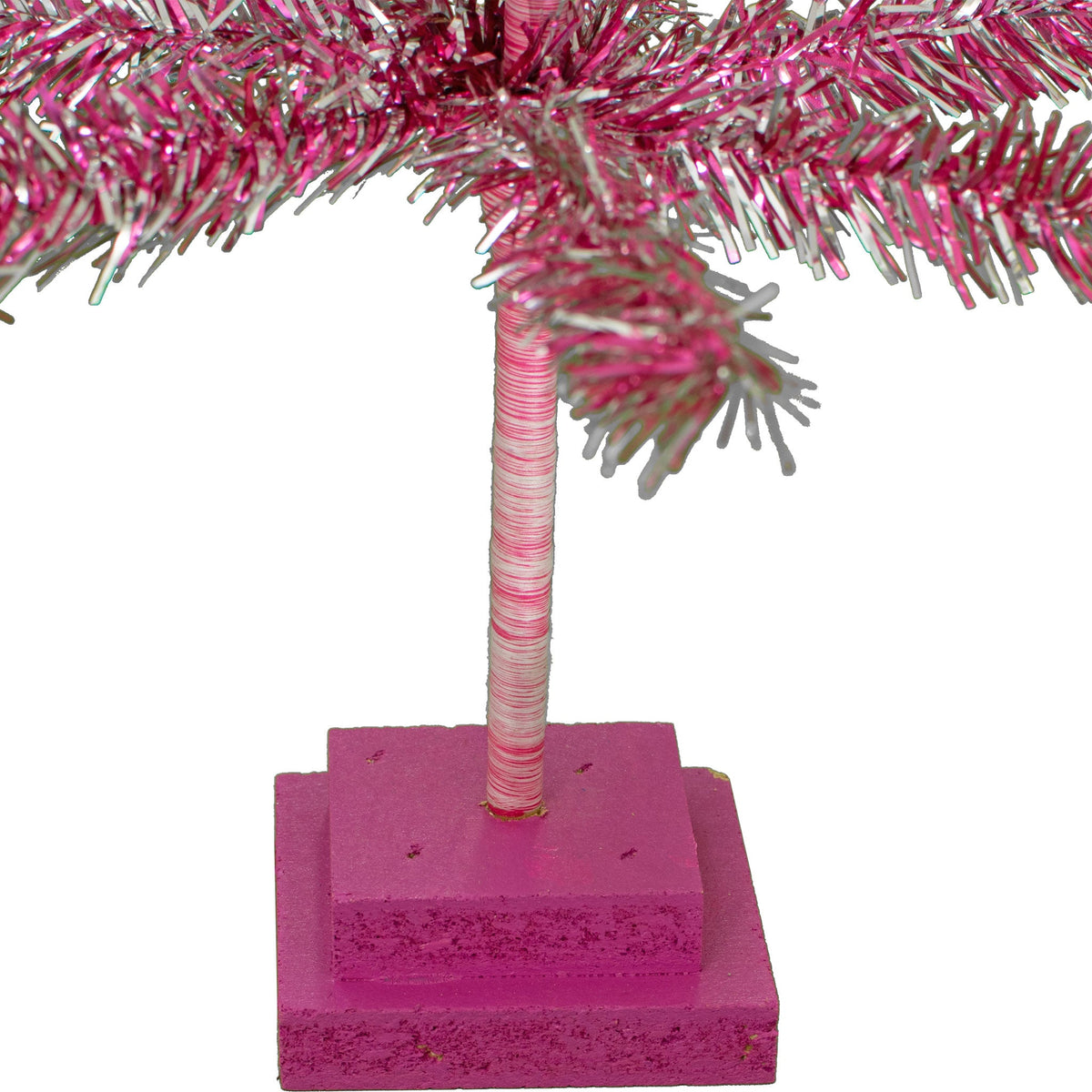 Stand Included: A double-tiered wooden base comes painted in a special color to match your tree.  Stands are made from recycled CDX Plywood with rough edges and cuts.  