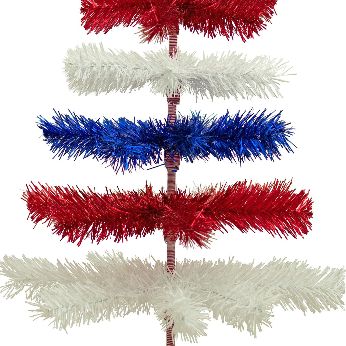 48in tall Red, White, and Blue Layered Tinsel Christmas Trees made by hand in the USA.  Decorate for the holidays with retro 4th of July-themed Trees and start creating your centerpiece now.  Shop for more at leedisplay.com