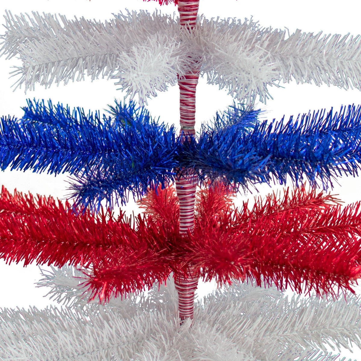 60in tall Red, White, and Blue Layered Tinsel Christmas Trees made by hand in the USA.  Decorate for the holidays with retro 4th of July-themed Trees and start creating your centerpiece now.  Shop for more at leedisplay.com