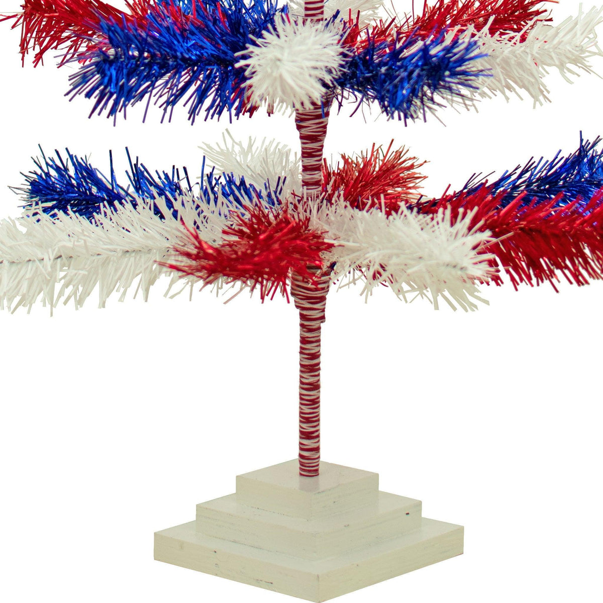 3FT Trees come with White tiered wooden bases.  36in Tall Red White and Blue Mixed Tinsel Christmas Tree on sale at leedisplay.com.