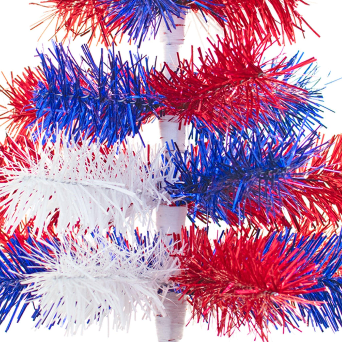 Middle branches of the 18in Tall Red White and Blue Mixed Tinsel Christmas Tree on sale at leedisplay.com.
