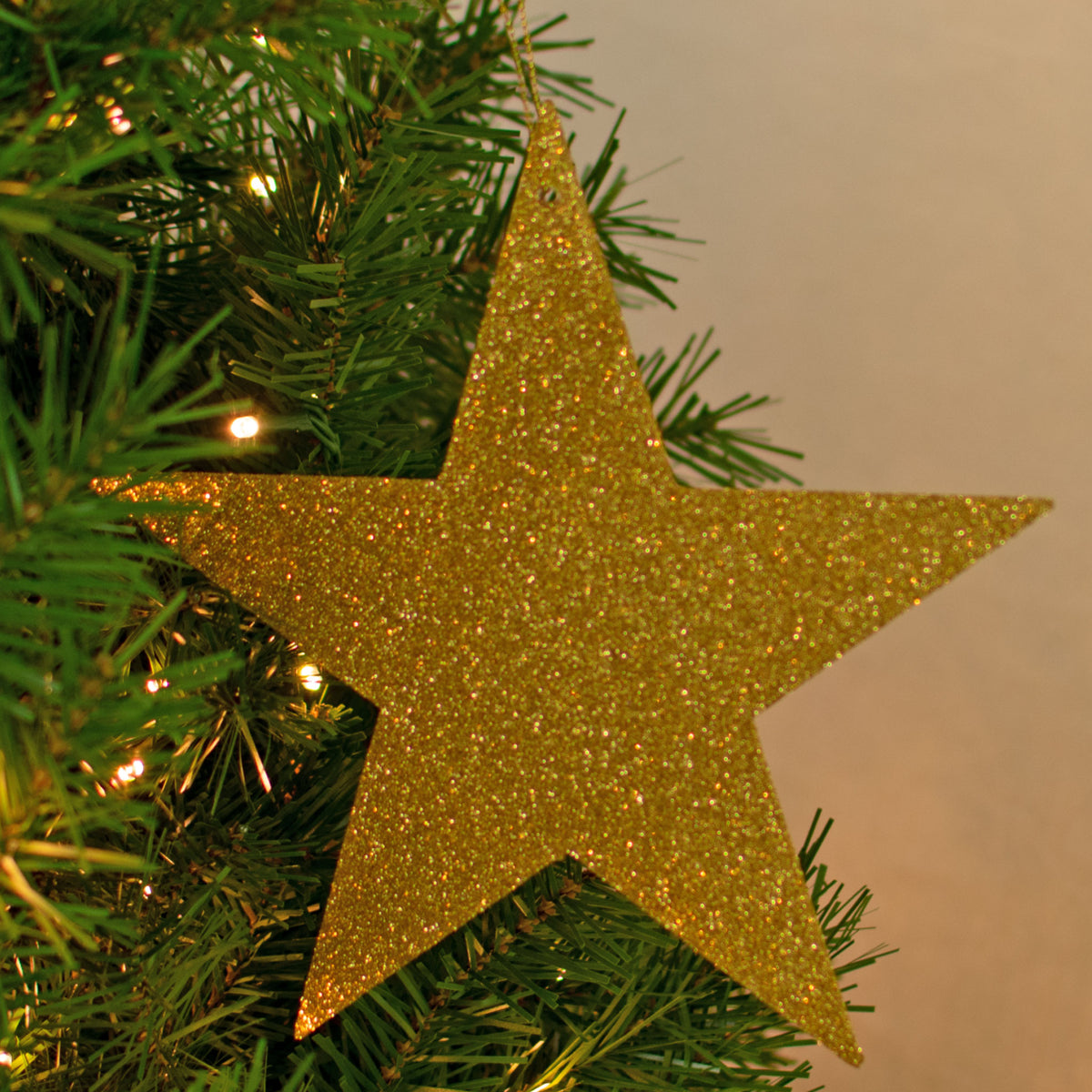 Shiny Gold Glittered Stars are your perfect Christmas Ornaments and Holiday Decorations!