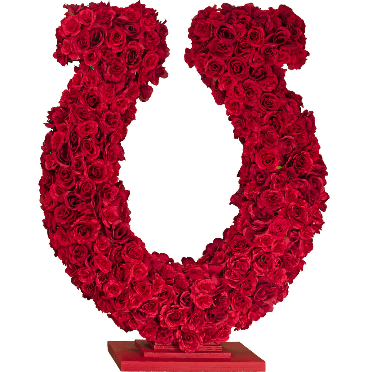 40in tall Rose Petal Horseshoe Centerpiece and Tabletop Display made with artificial rosebud flowers on a foam core and a wooden base painted in red.