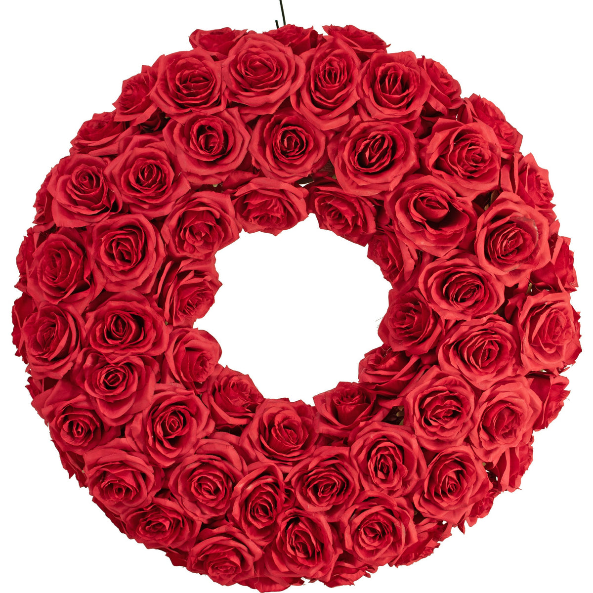 A photo of the Red Rose Wreath hanging on a hook