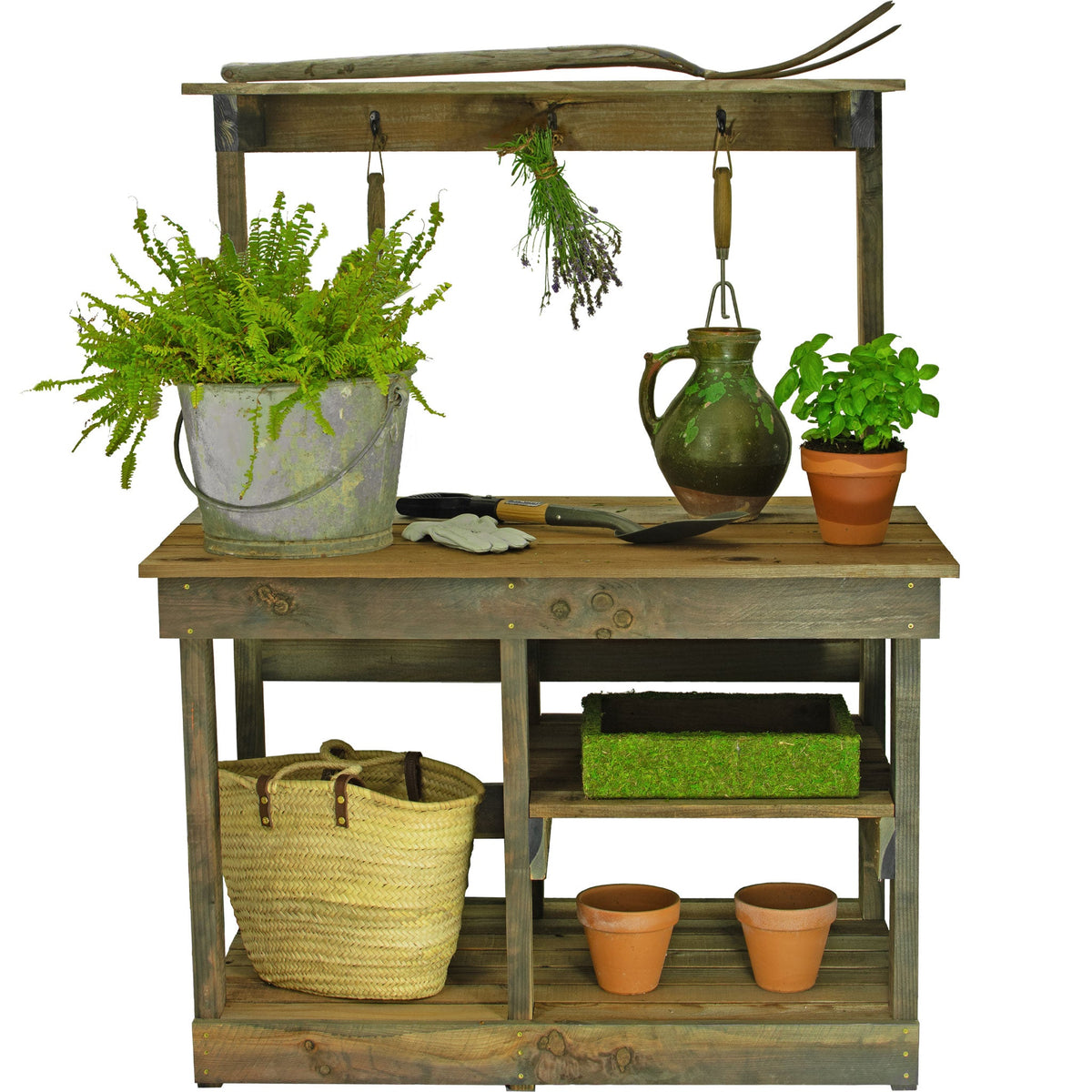 The Rustic Redwood Potting Table and Gardening Workbench with gardening supplies, tools, pots, and plants.