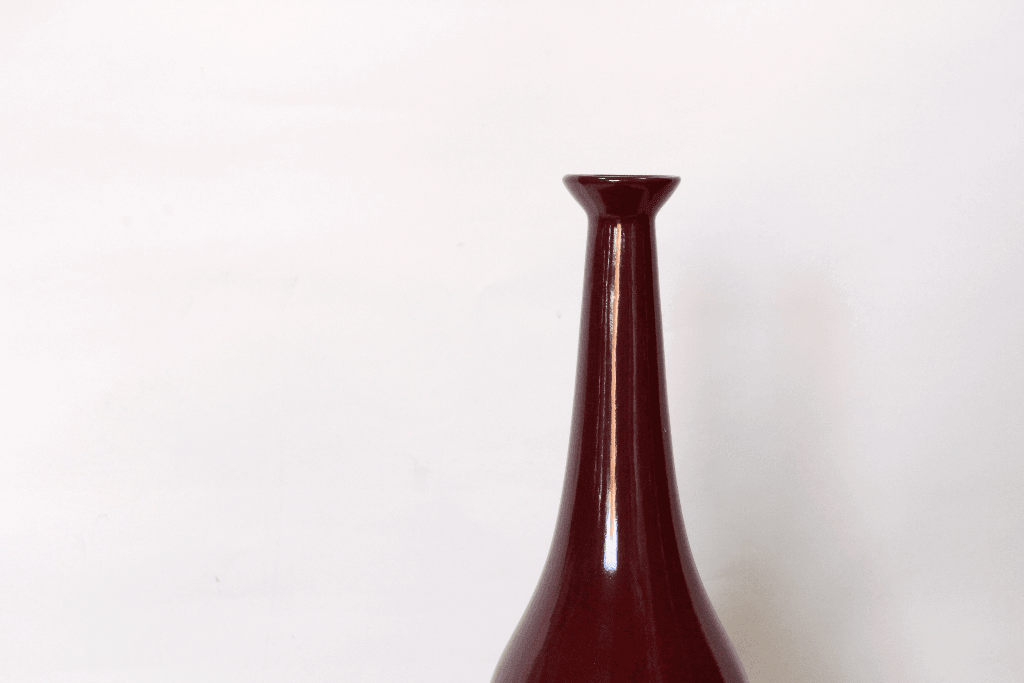 Lee Display's brand new Milk Bottle Shaped Ceramic Vase comes in a high gloss burgundy red finish on sale at leedisplay.com