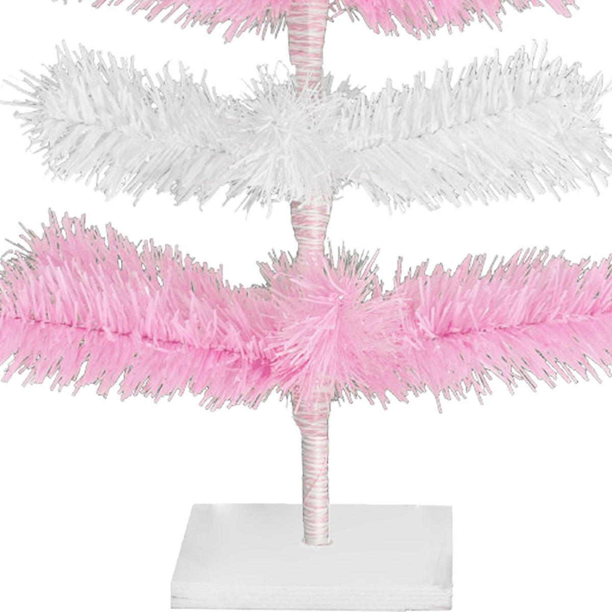 Pink & White Layered Tinsel Christmas Trees! Decorate for the holidays with a Shiny Pink and Matte White retro-style Christmas Tree. Incorporate a little purple and white into your holiday decorations this year. On sale at leedisplay.com