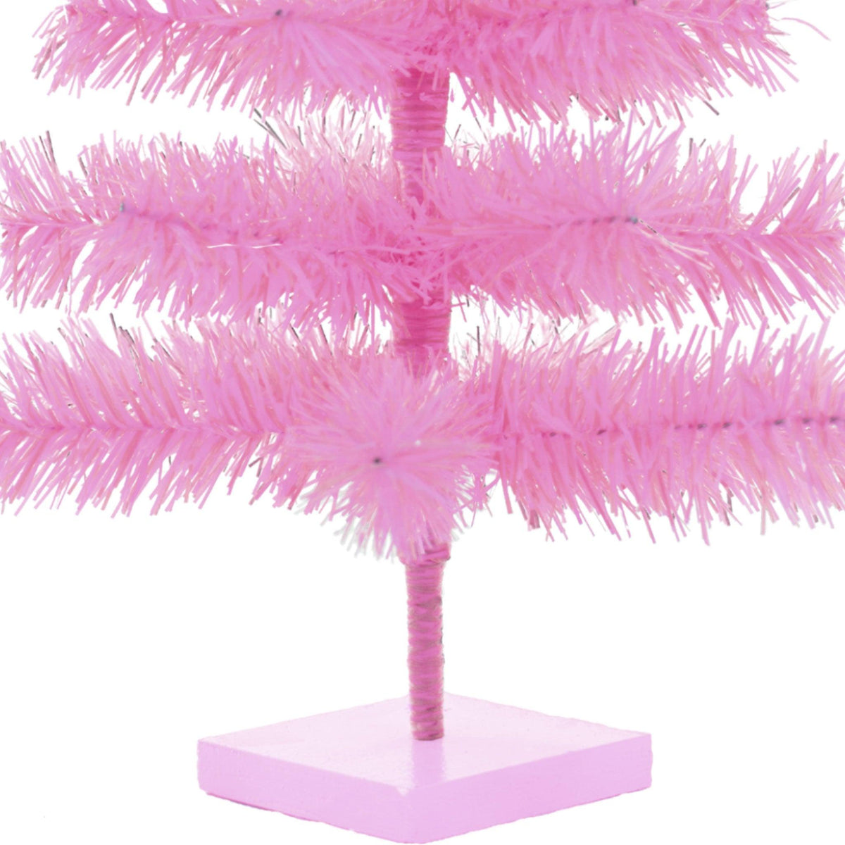 24 inch trees come with a wooden single tiered base painted pink to match the color of your tree.