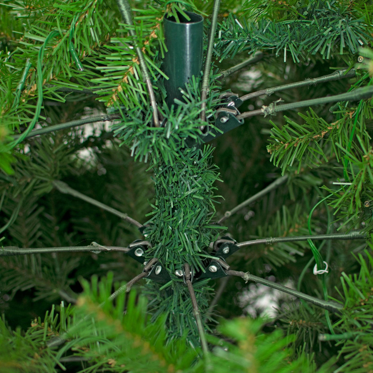 Close-up of the branch hinges on the steel frame.  10FT Premier Pine Tree Pre-Lit with LED Lights.  On sale from leedisplay.com