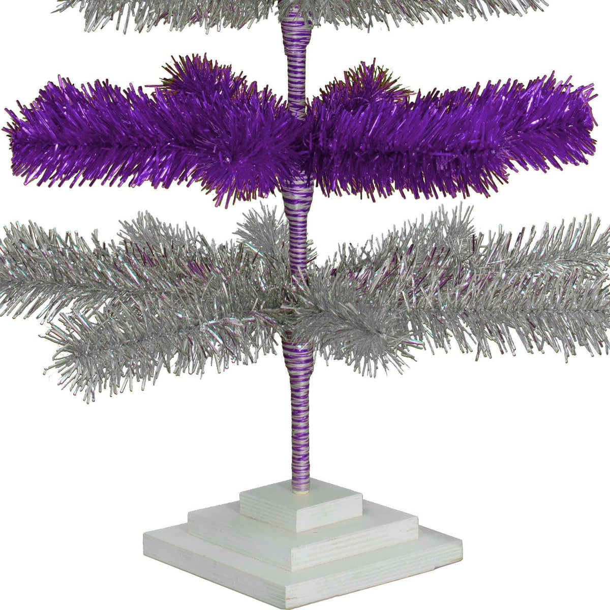 48in Tall Purple & Silver Layered Tinsel Christmas Trees! Decorate for the holidays with a Shiny Purple and Metallic Silver retro-style Christmas Tree. On sale now at leedisplay.com