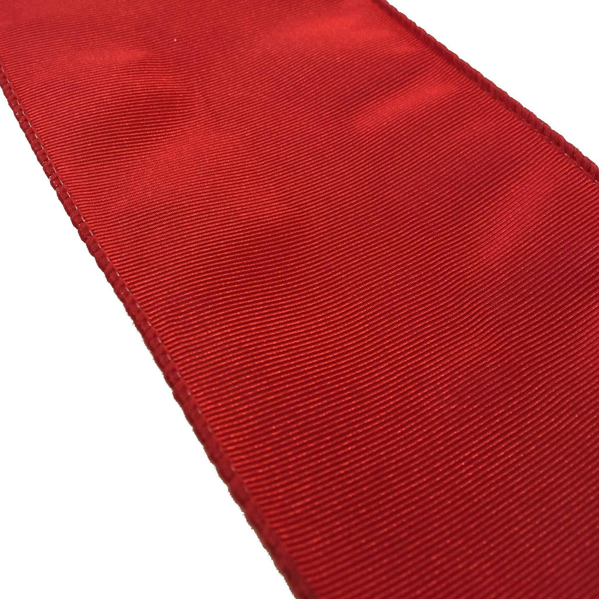 Up close of the pattern on Lee Display's roll of Red Bengaline Christmas Ribbon with a Wired-Edge on sale at leedisplay.com