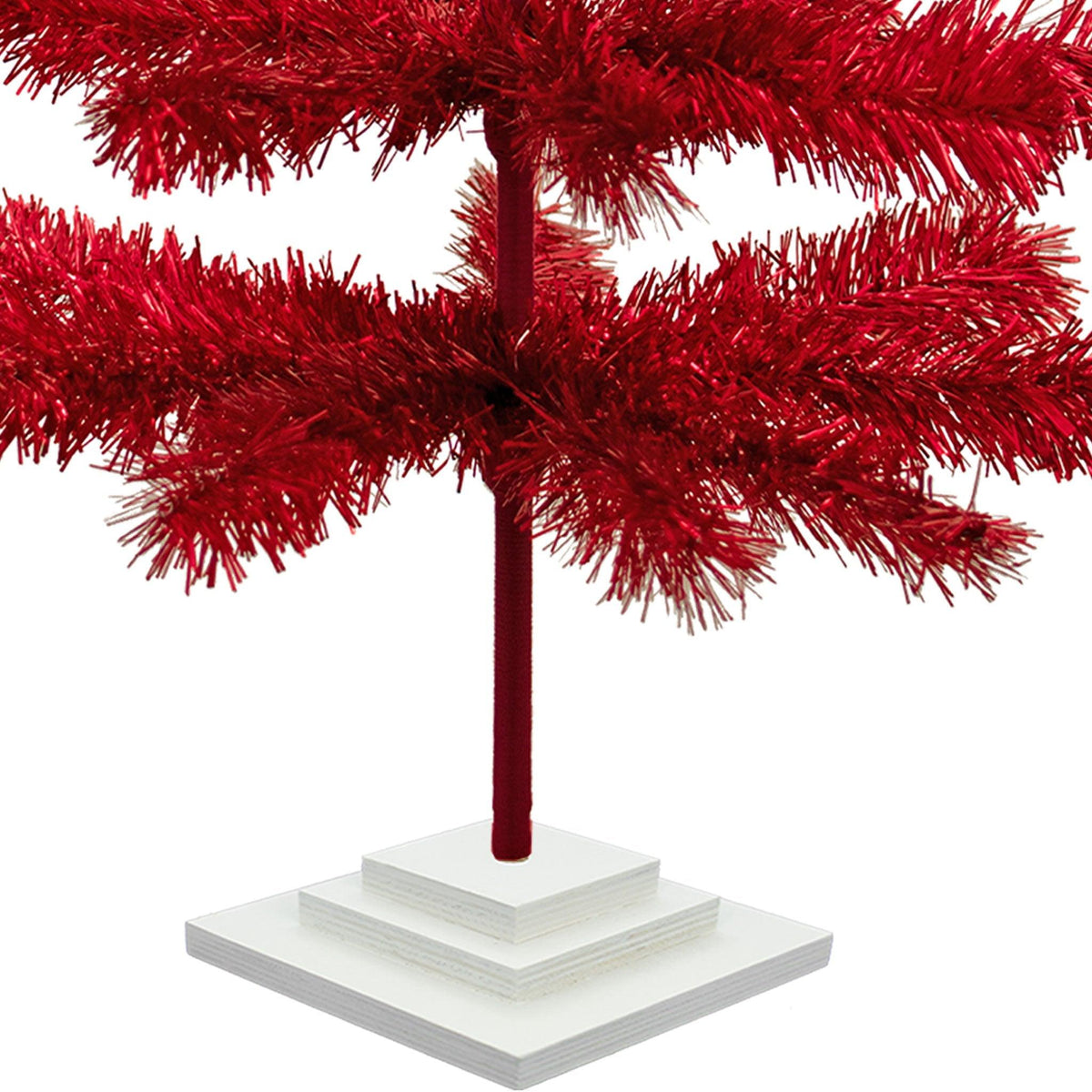 36in Red trees comes with a 3-tiered white wood stand that is easy to detach and secures the trees upright