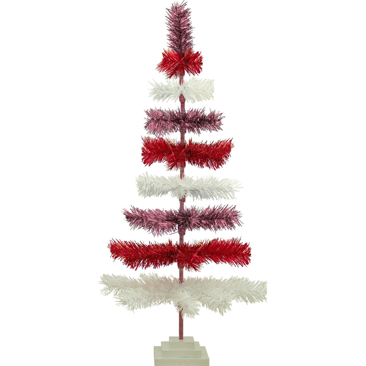 Red, White, and Pink Layered Tinsel Christmas Trees made by hand in the USA     Decorate for the holidays with retro Valentine's Day-themed Trees and start creating your centerpiece.  Shop now at leedisplay.com